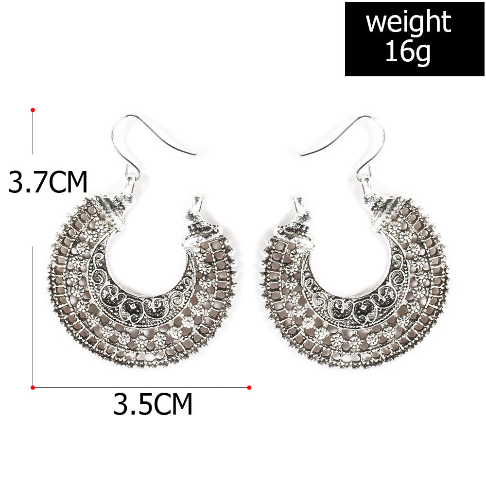 Carved openwork alloy earrings  fan earrings retro ethnic style earrings